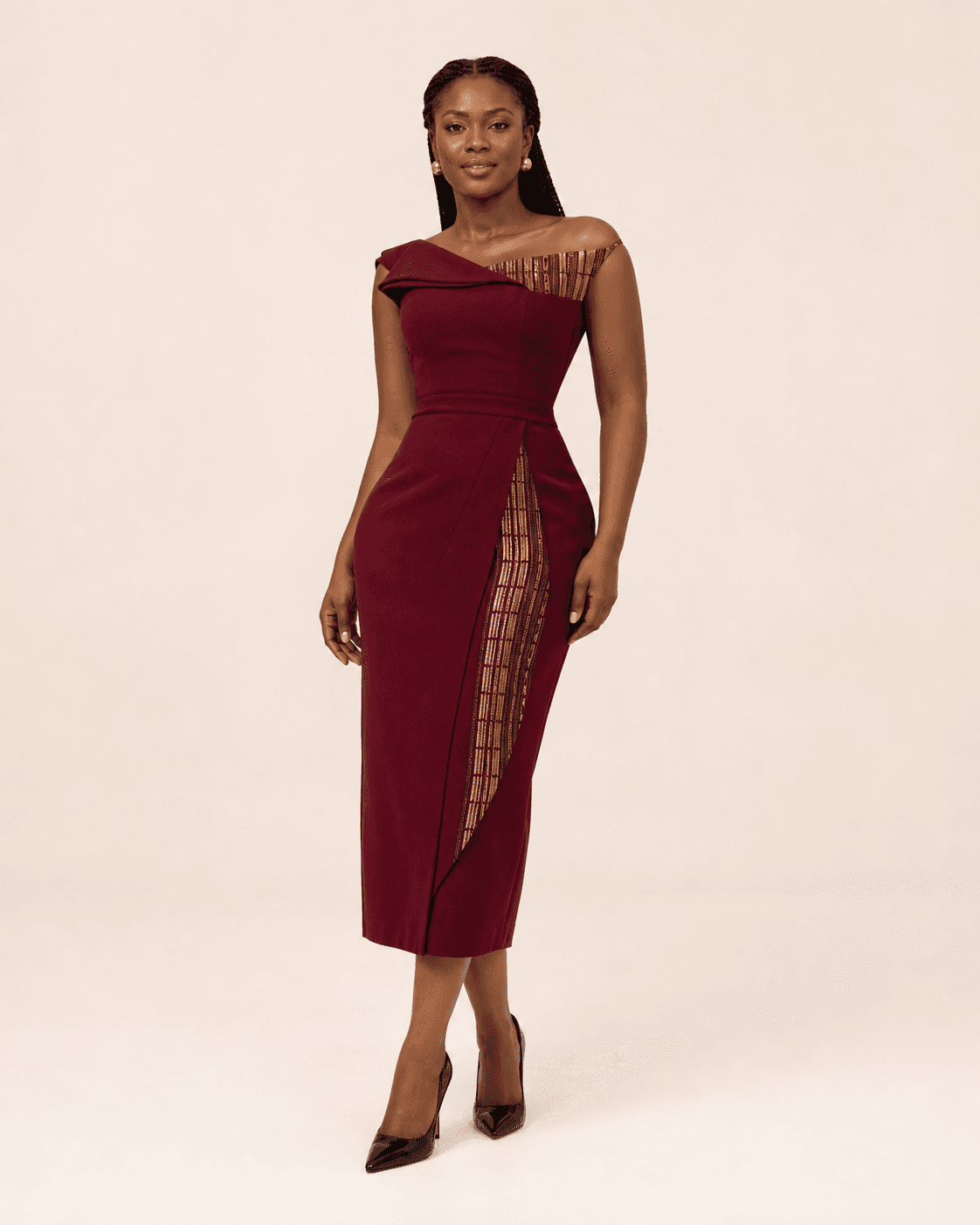 Woman wearing the Nhyira wine midi dress